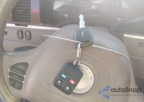 2003 Lincoln Town Car Executive из США, поврежденный, VIN 1LNHM81W33Y660267